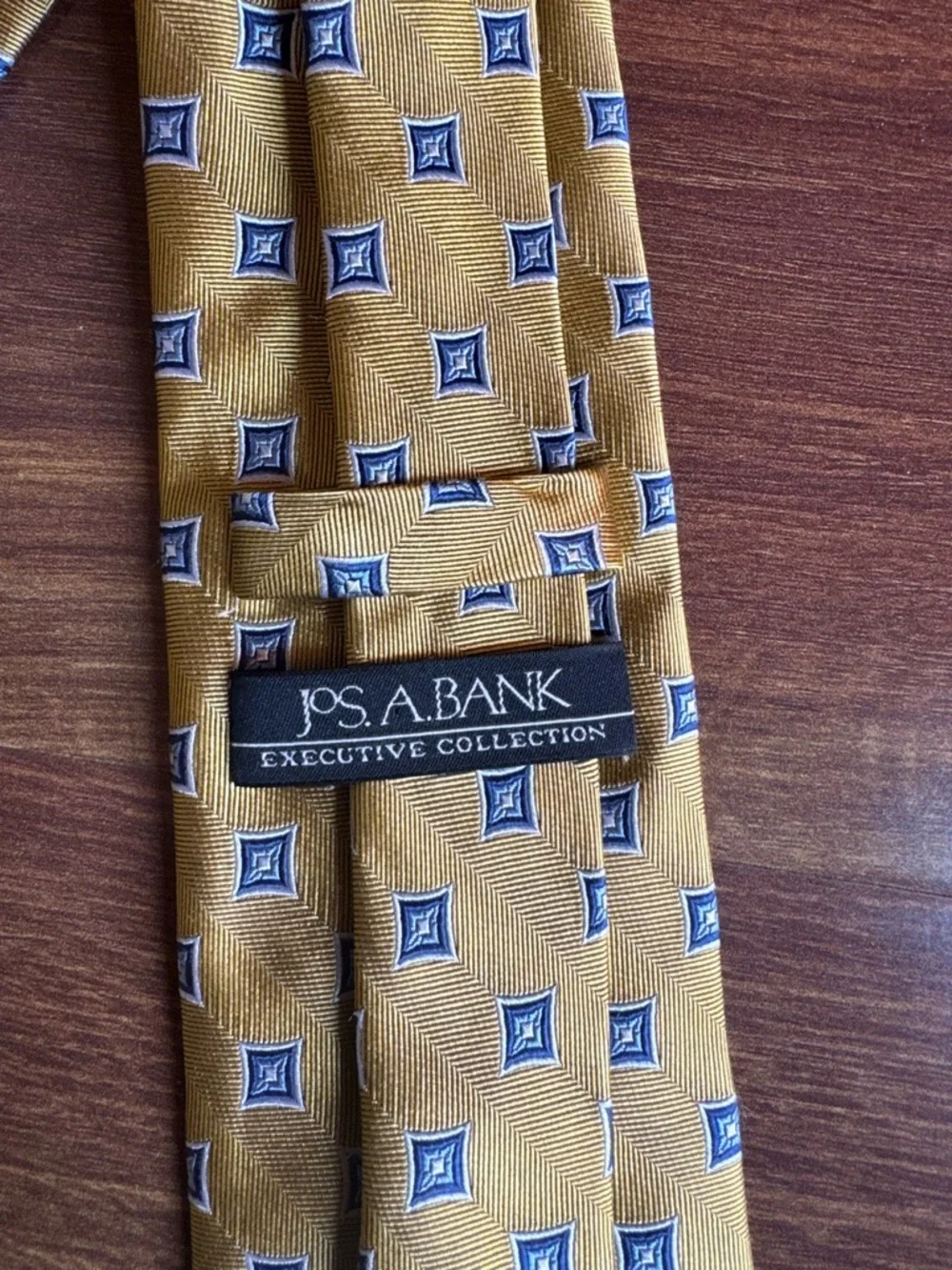 JOS A. BANK Executive Collection Mustard Yellow Tie with Navy Diamond Motif